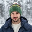 Ocieplana czapka zimowa z pomponem zielona ST-563C